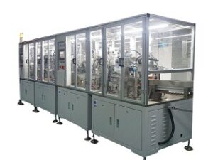 Automated manufacturing machine for battery terminal connectors